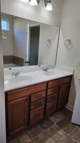 a sink with a mirror