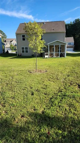 a view of a house with a swimming pool