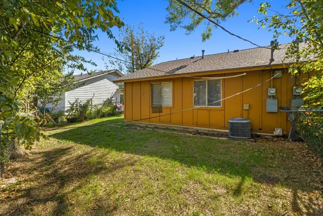 a view of backyard with backyard