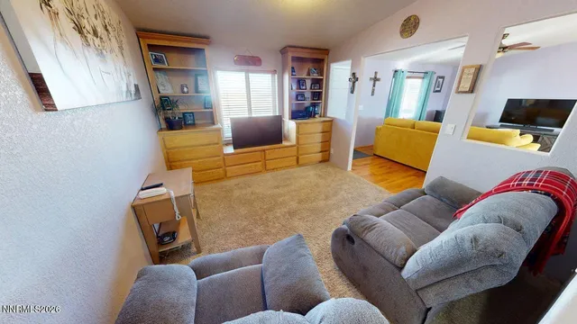 a living room with furniture and a couch