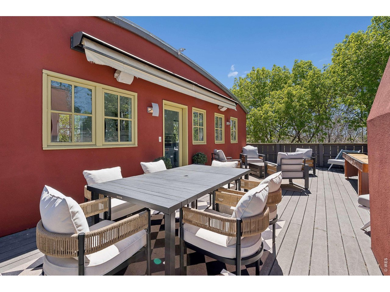 821 Incorrigible Circle Longmont, CO 80504 - Photo 22 of 43 a view of a patio with table and chairs and potted plants