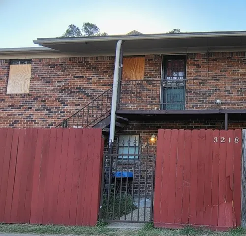 a front view of a house with garage