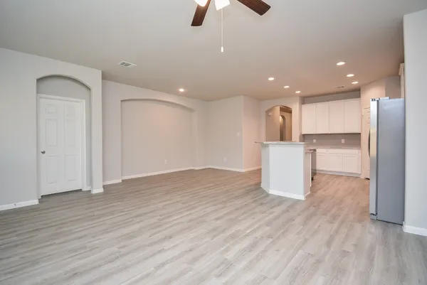 a view of kitchen with wooden floor