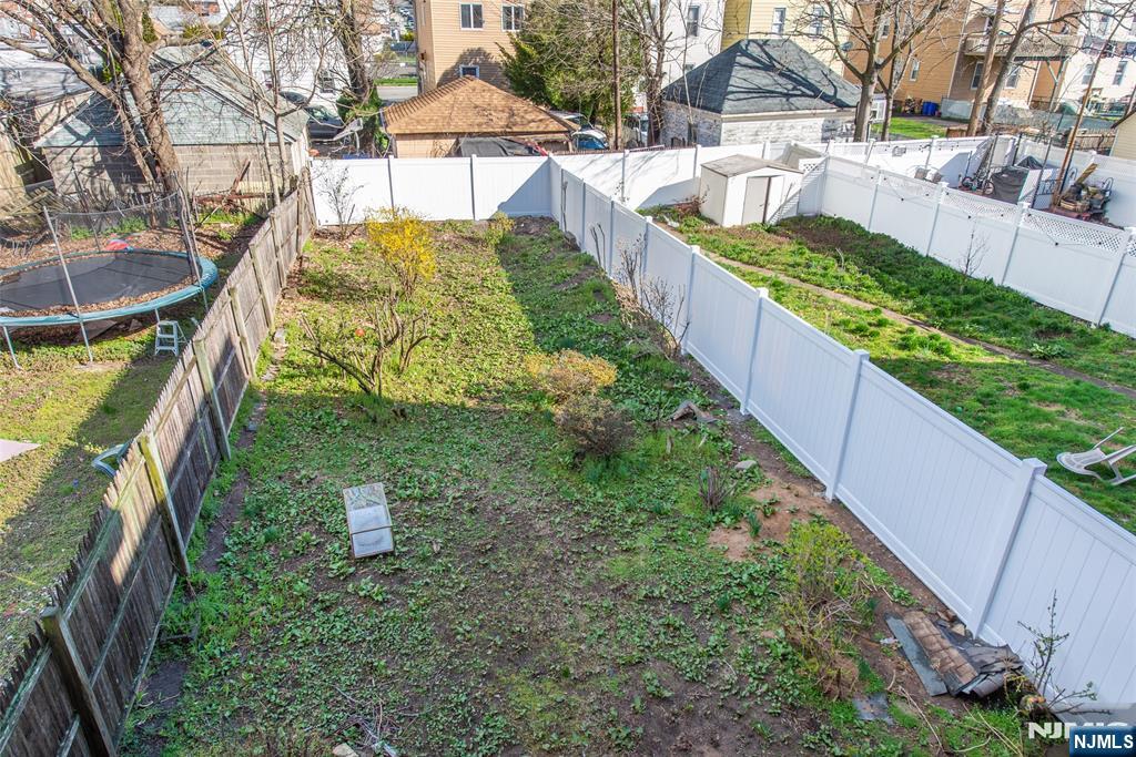 51 Maple Street Garfield, NJ 07026 - Photo 12 of 12 a view of swimming pool with a patio