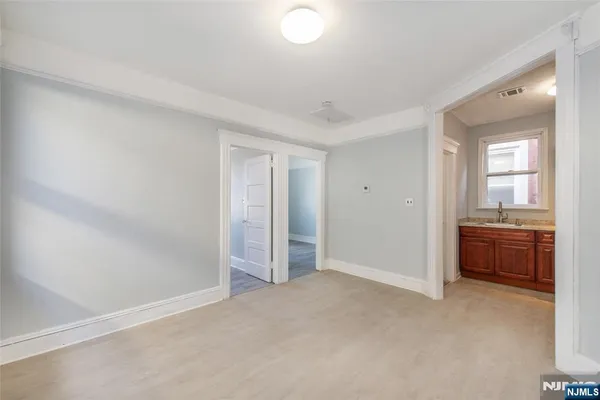 a view of livingroom with kitchen