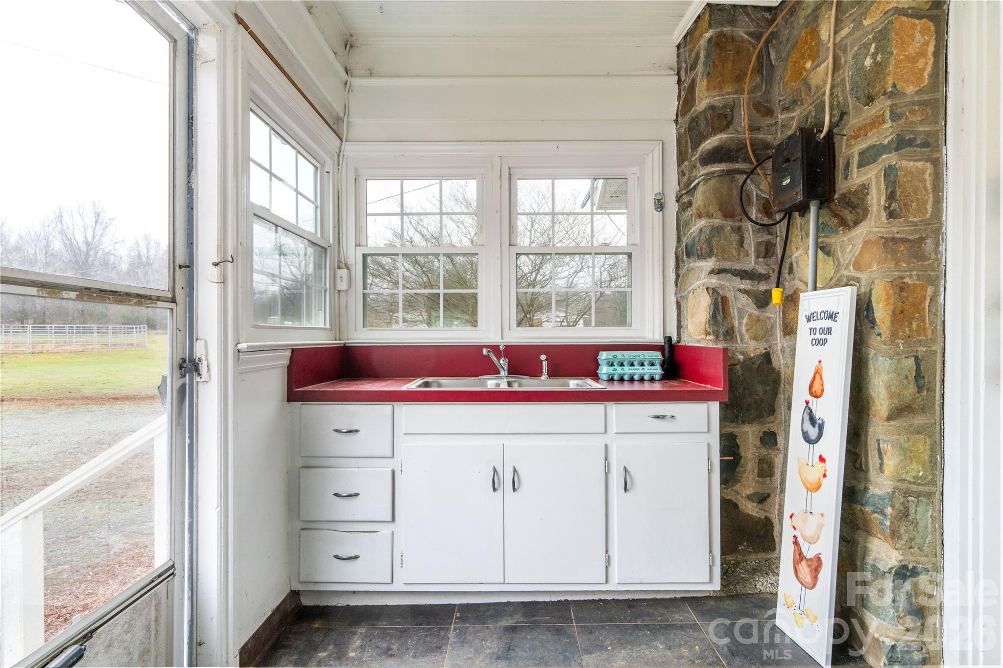 6507 Frieden Church Road Gibsonville, NC 27249 - Photo 16 of 45 a view of a kitchen with a stove
