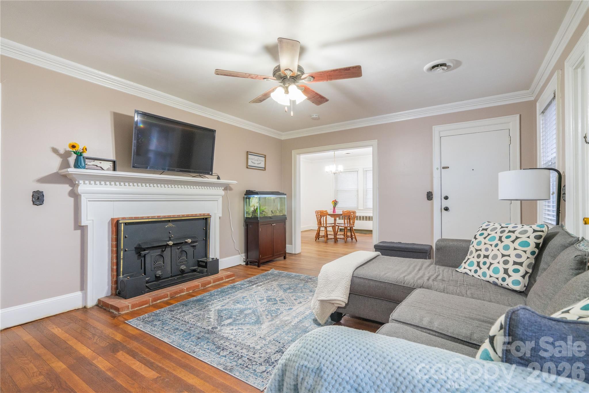 6507 Frieden Church Road Gibsonville, NC 27249 - Photo 24 of 45 a living room with furniture and a fireplace