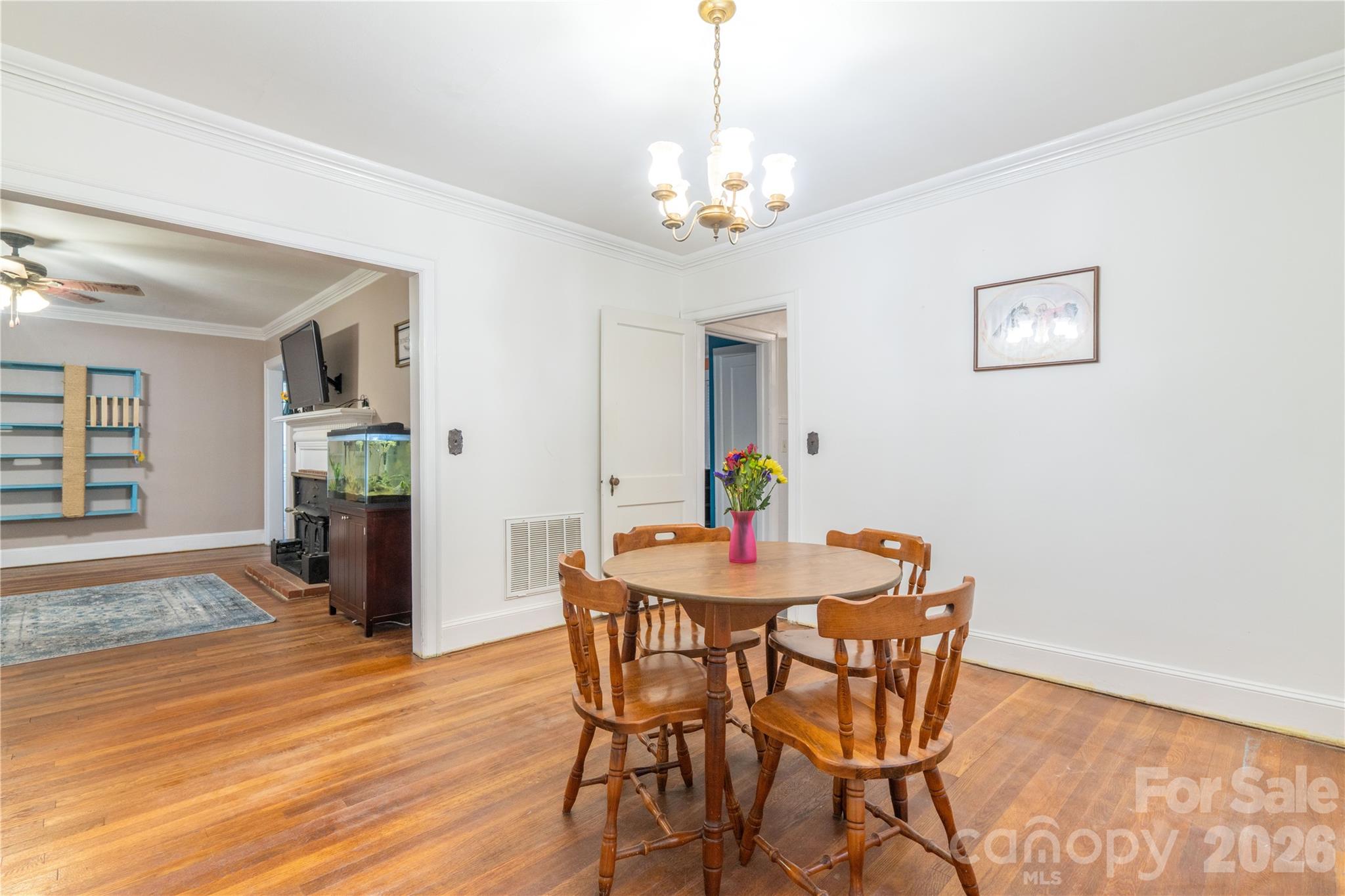 6507 Frieden Church Road Gibsonville, NC 27249 - Photo 26 of 45 a view of a dining room with furniture and wooden floor