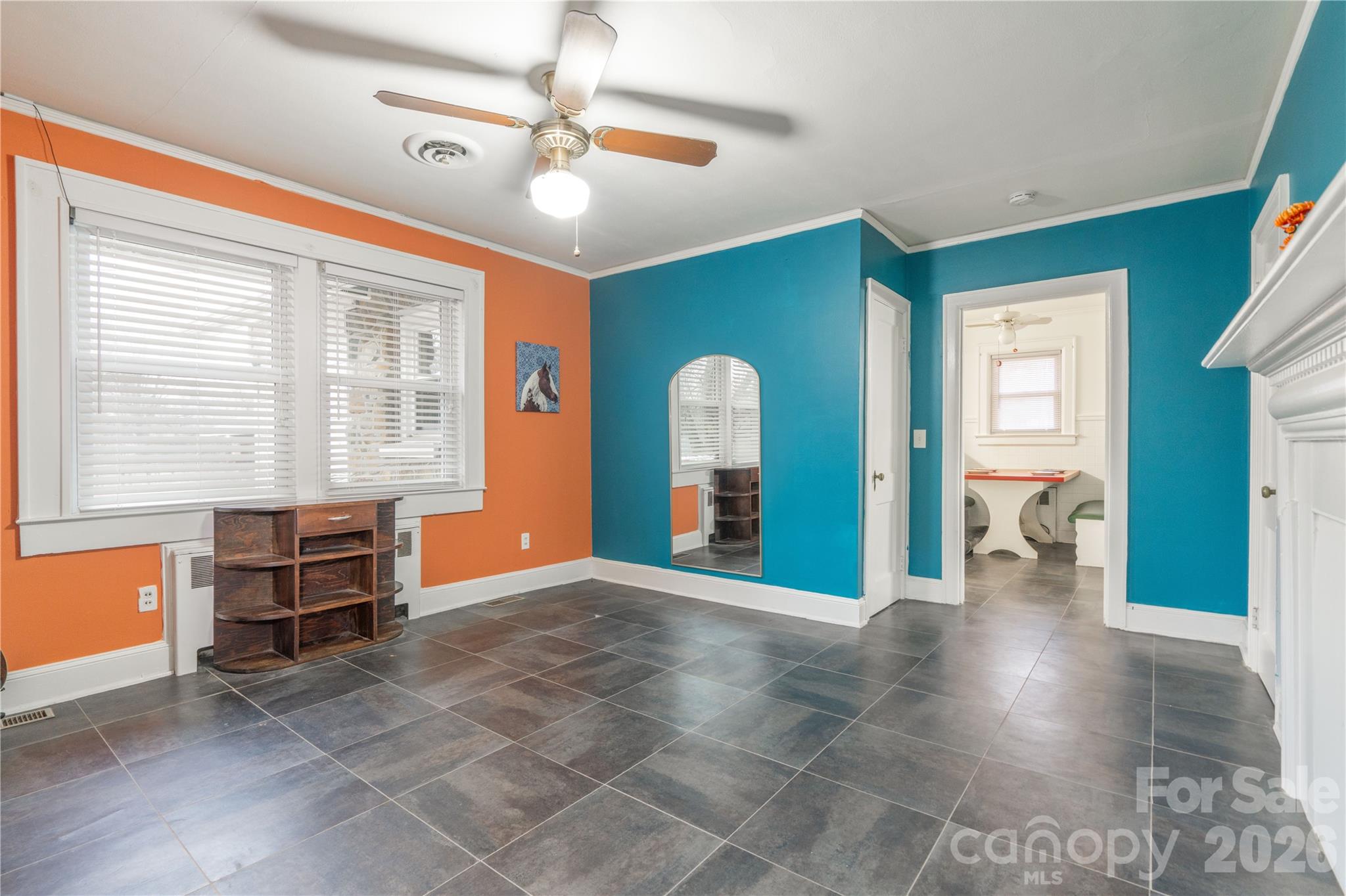 6507 Frieden Church Road Gibsonville, NC 27249 - Photo 28 of 45 a view of an empty room with furniture and a window