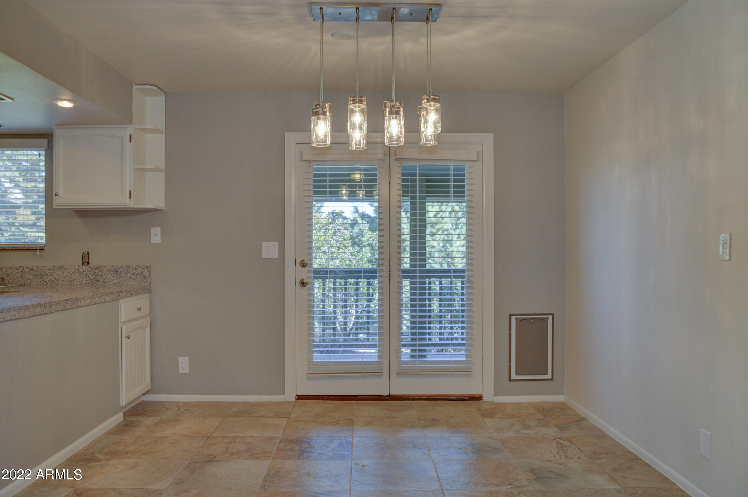 685 Dragonfly Drive Prescott, AZ 86301 - Photo 6 of 24 a view of an empty room with a window