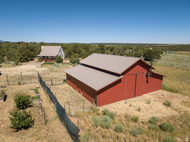 684 Blue Mountain Ridge Monticello, UT 84535 - Photo 16 of 71 View of outbuilding with a rural view