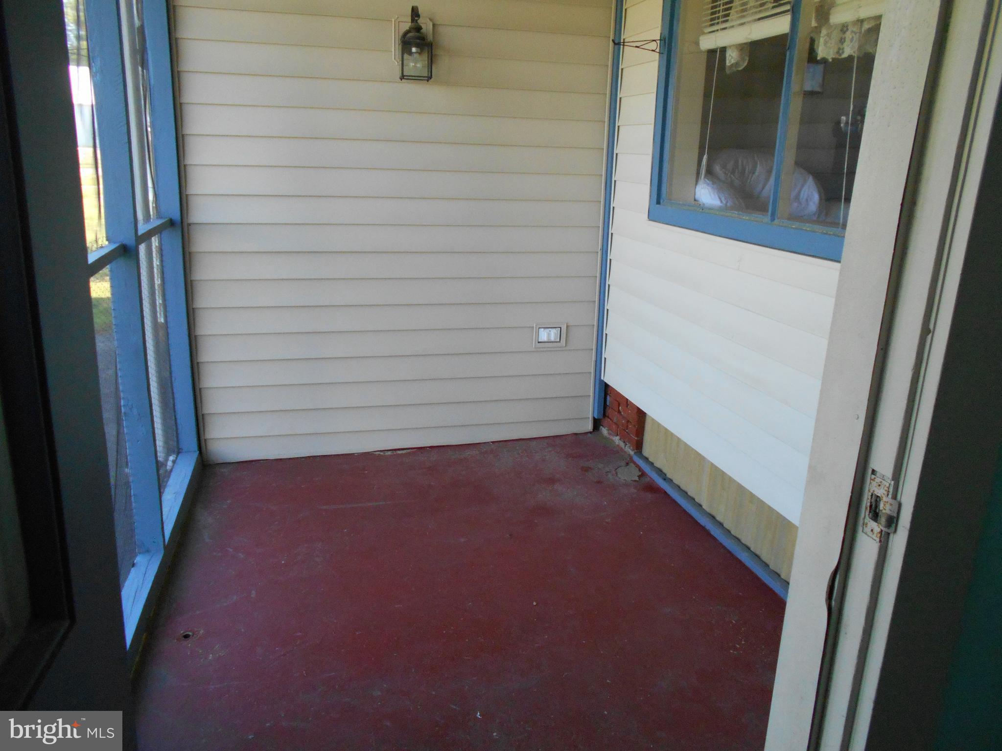 5841 Hudson Wharf Road Cambridge, MD 21613 - Photo 23 of 46 Rear porch