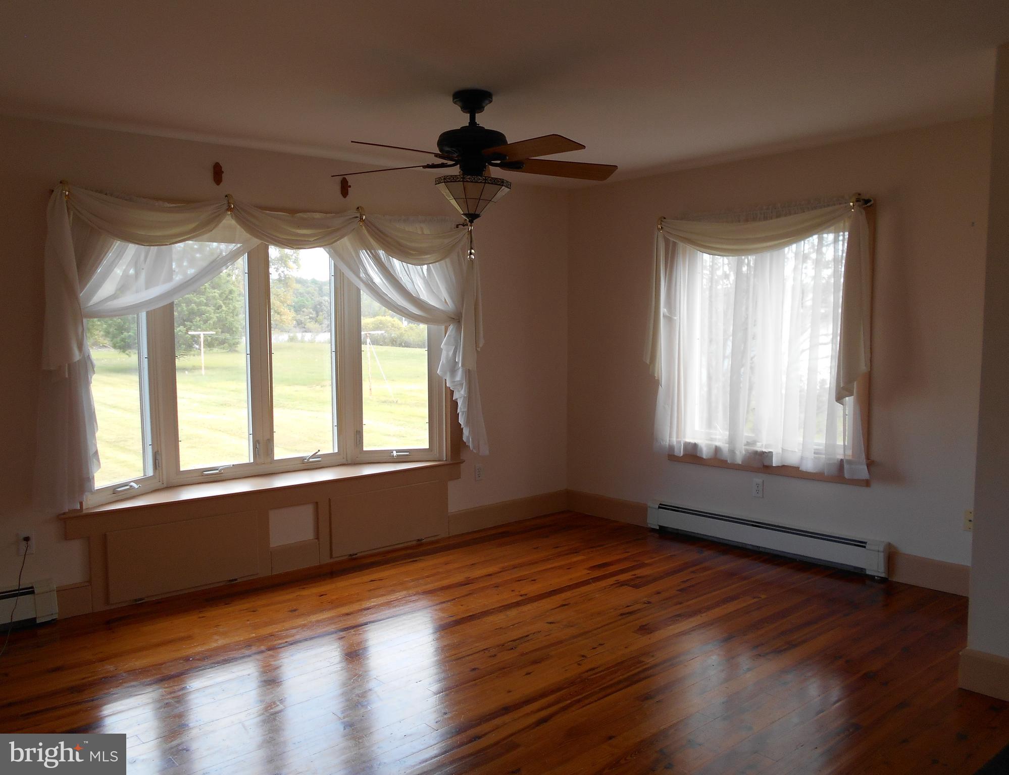 5841 Hudson Wharf Road Cambridge, MD 21613 - Photo 29 of 46 large living room w/water view