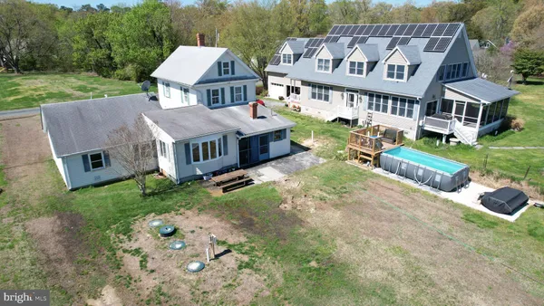an aerial view of a house with a garden