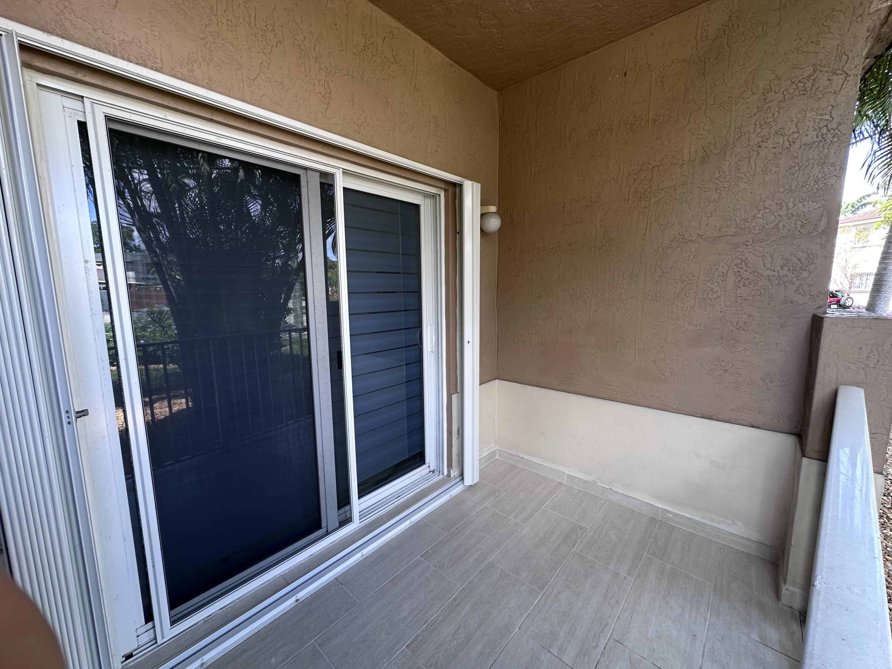 300 East 4th Street, Unit 103 Hialeah, FL 33010 - Photo 2 of 27 Master porch