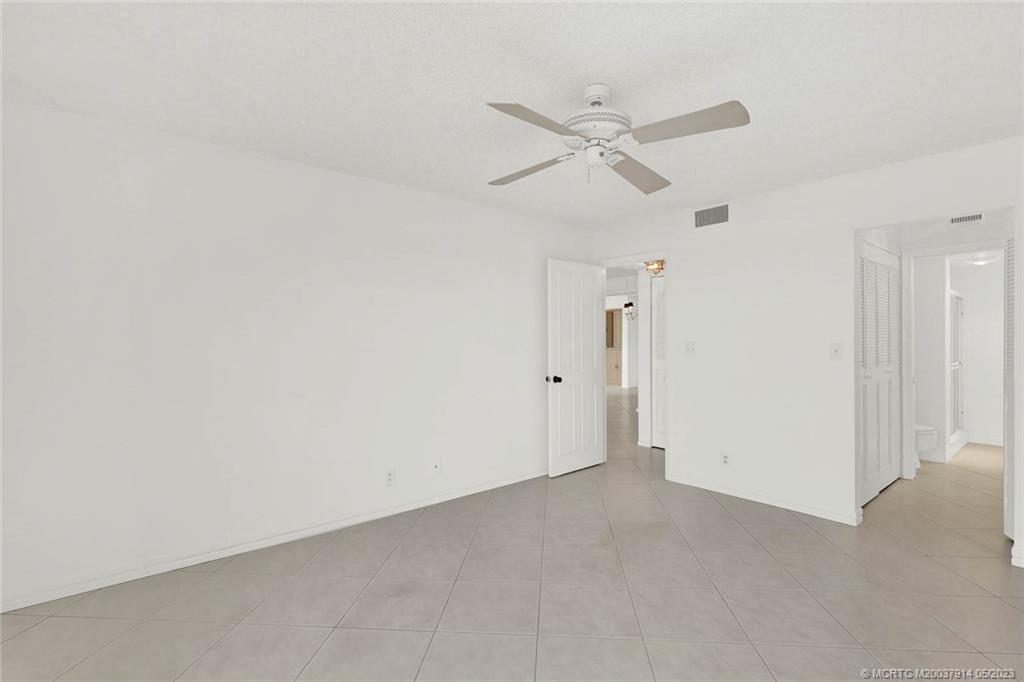 1950 Southwest Palm City Road, Unit 14207 Stuart, FL 34994 - Photo 23 of 50 Master bedroom suite