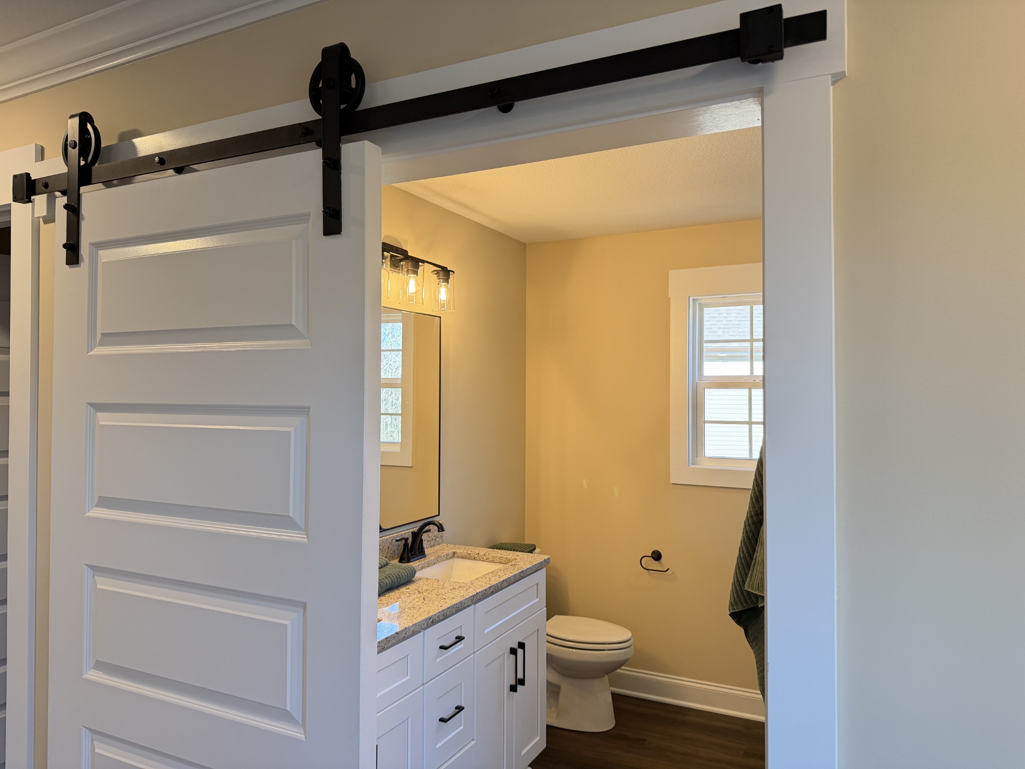 128 Hummingbird Way Clarksville, TN 37043 - Photo 12 of 19 a bathroom with a granite countertop sink toilet and shower