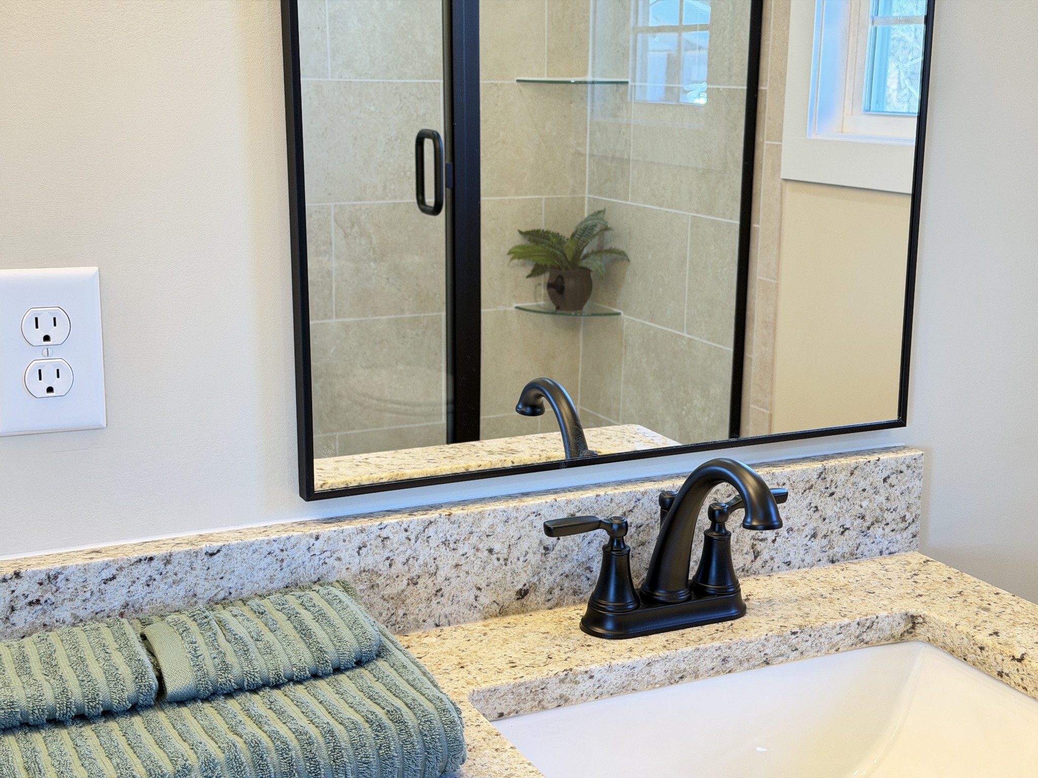 128 Hummingbird Way Clarksville, TN 37043 - Photo 13 of 19 a bathroom with a granite countertop sink and a mirror