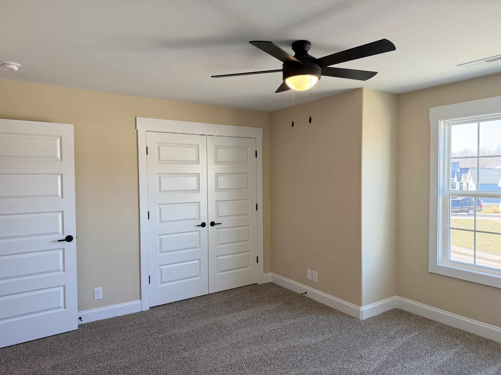 128 Hummingbird Way Clarksville, TN 37043 - Photo 15 of 19 a view of an empty room with a window