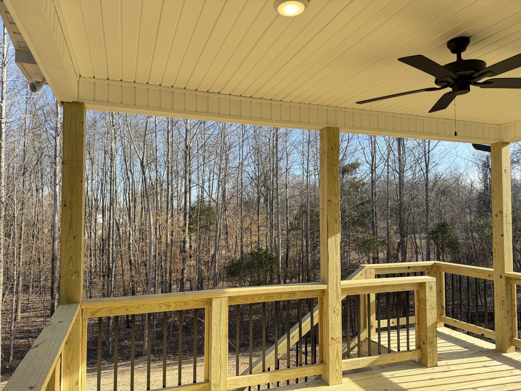 128 Hummingbird Way Clarksville, TN 37043 - Photo 19 of 19 a view of a balcony with a floor to ceiling window and wooden floor