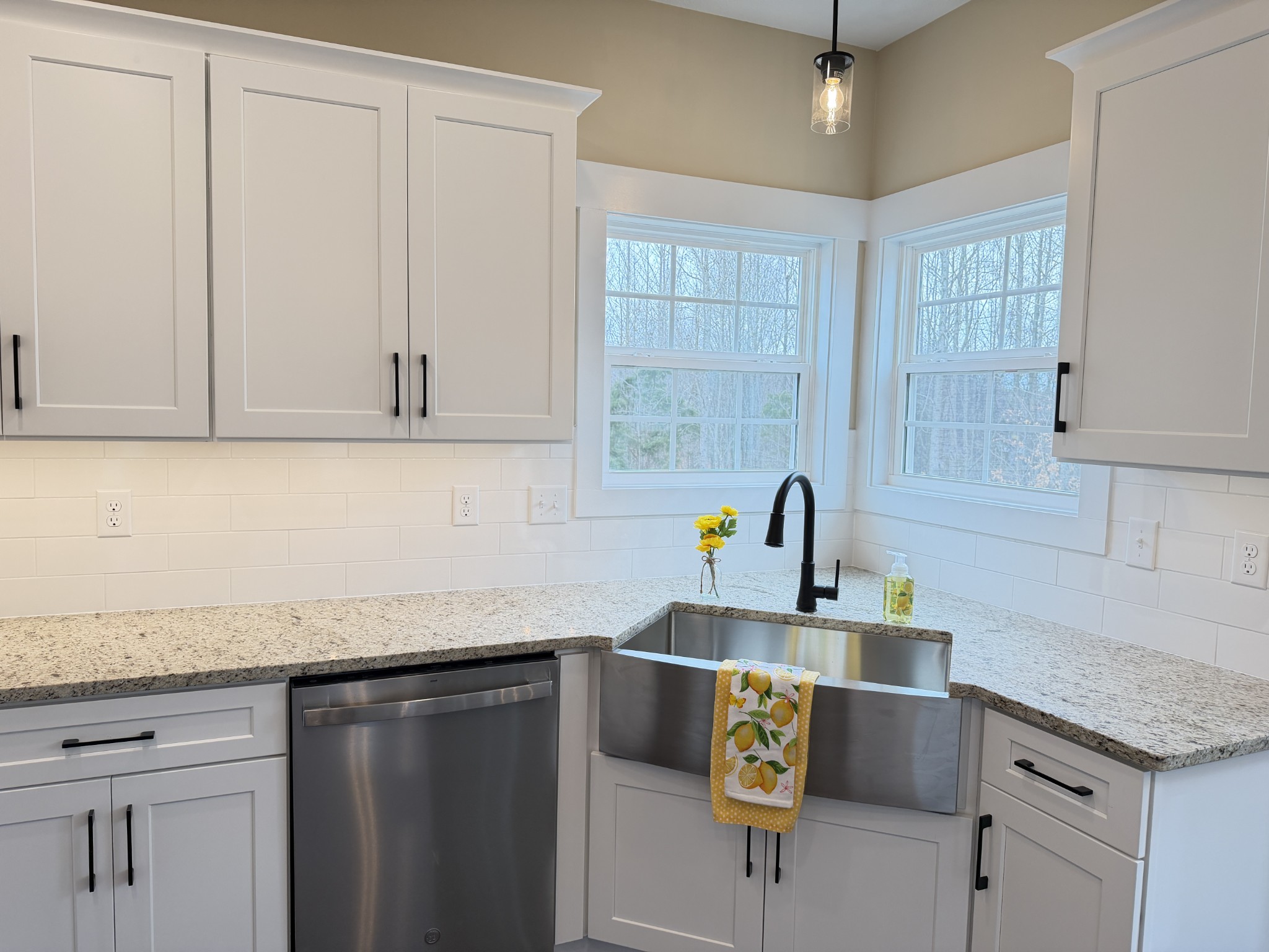128 Hummingbird Way Clarksville, TN 37043 - Photo 4 of 19 a kitchen with stainless steel appliances granite countertop a sink stove and cabinets