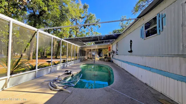 a view of a porch with furniture
