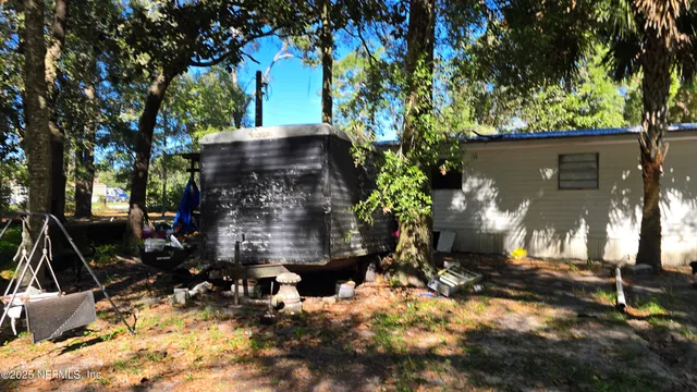 a view of outdoor space and yard