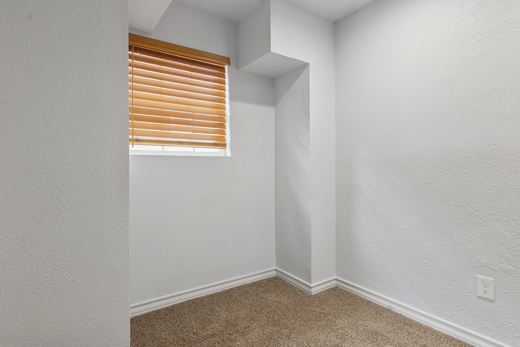 4505 Cochran Street Houston, TX 77009 - Photo 10 of 25 a view of an empty room with a window