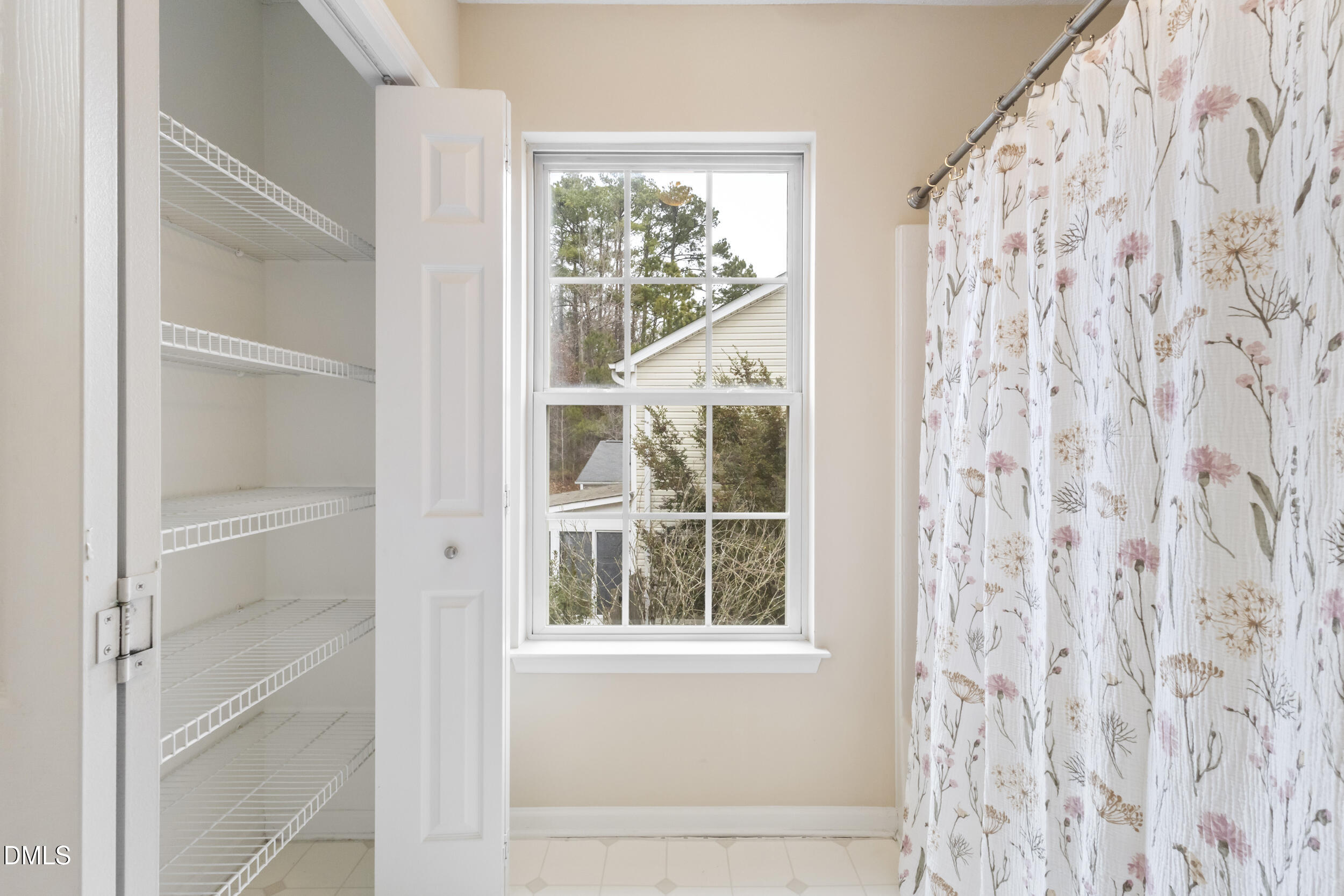 4616 Silverdene Street Raleigh, NC 27616 - Photo 27 of 42 Primary bathroom with linen closet