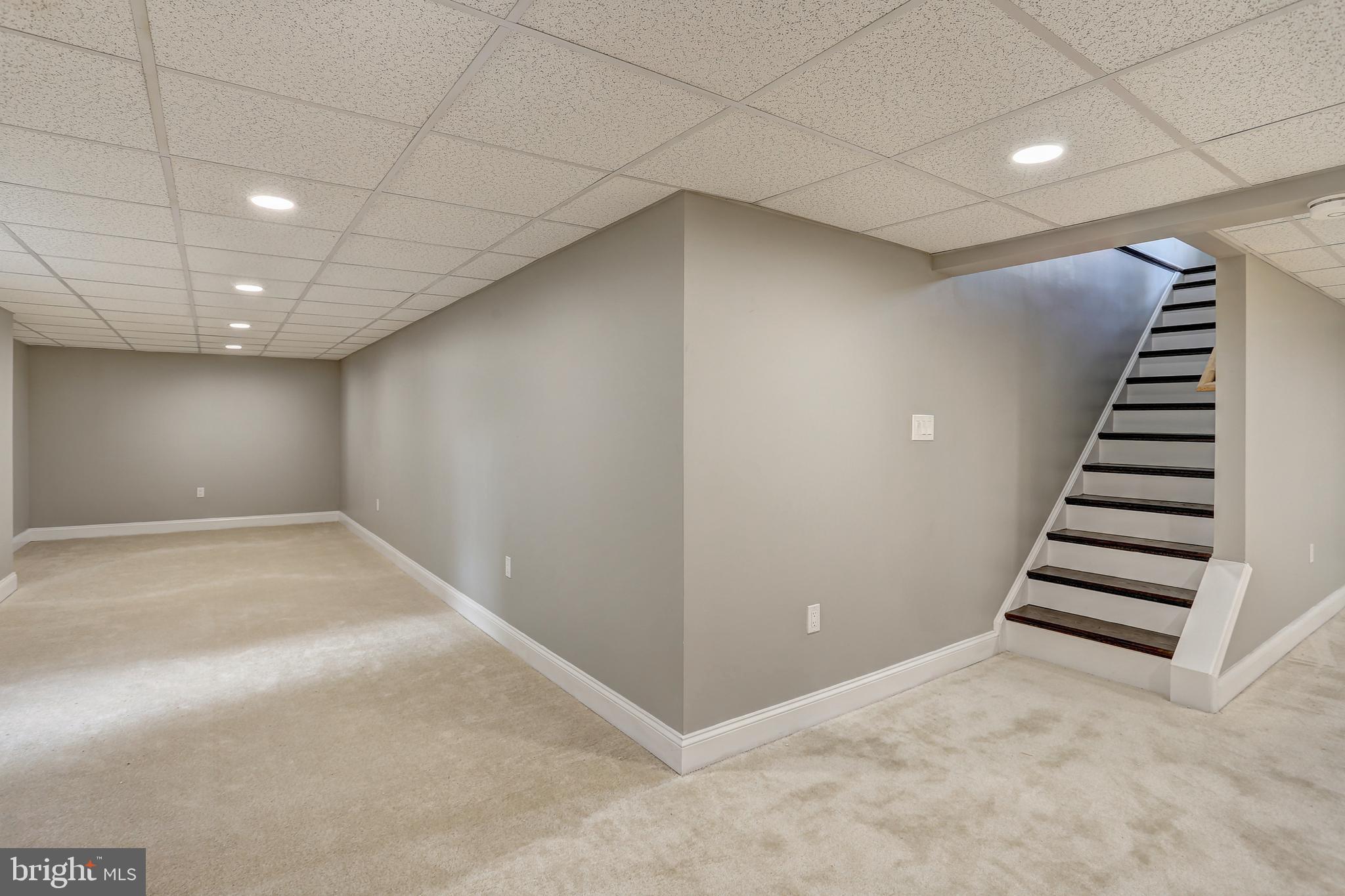13649 Highland Road Clarksville, MD 21029 - Photo 30 of 56 STAIRS TO LOWER LEVEL - GAME ROOM TO THE LEFT