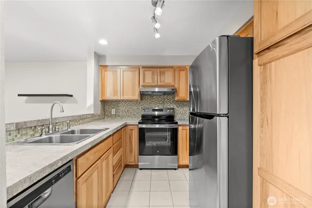 $315,000 | 1321 South Puget Drive, Unit E15, Renton, WA 98055