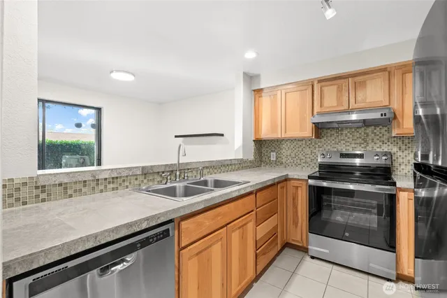 $315,000 | 1321 South Puget Drive, Unit E15, Renton, WA 98055