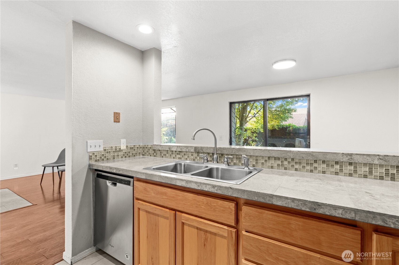 1321 South Puget Drive, Unit E15 Renton, WA 98055 - Photo 15 of 30 a view white cabinets and sink