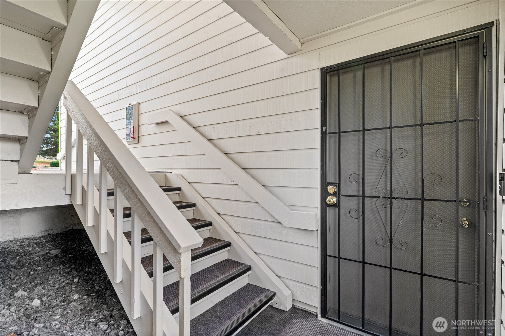 1321 South Puget Drive, Unit E15 Renton, WA 98055 - Photo 2 of 30 a view of an entryway with staircase