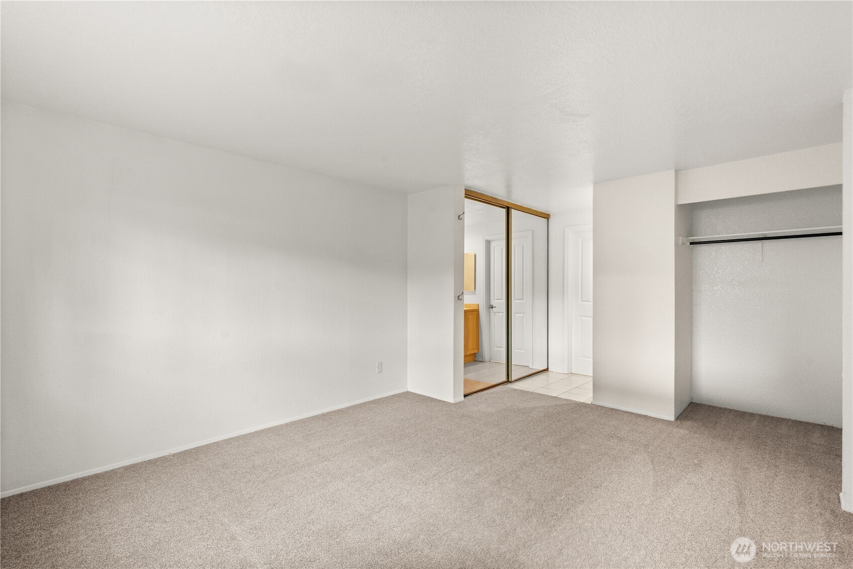 1321 South Puget Drive, Unit E15 Renton, WA 98055 - Photo 22 of 30 a view of an empty room and a window