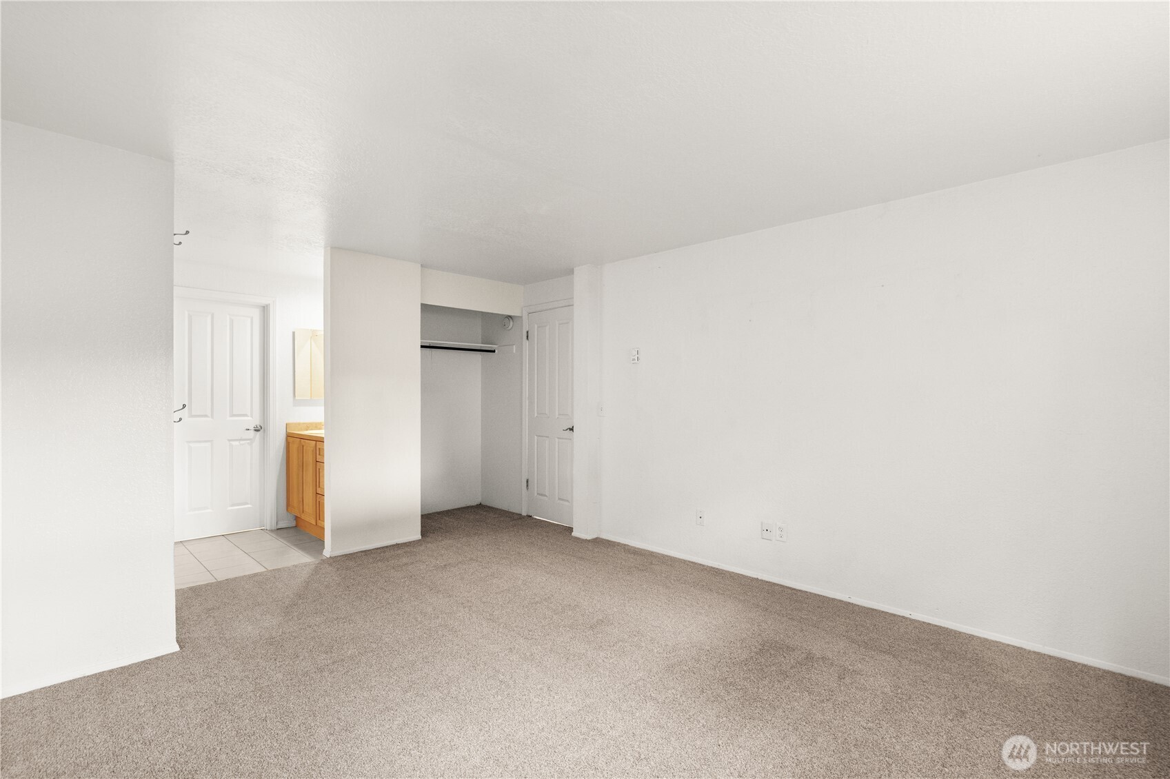 1321 South Puget Drive, Unit E15 Renton, WA 98055 - Photo 23 of 30 a view of an empty room