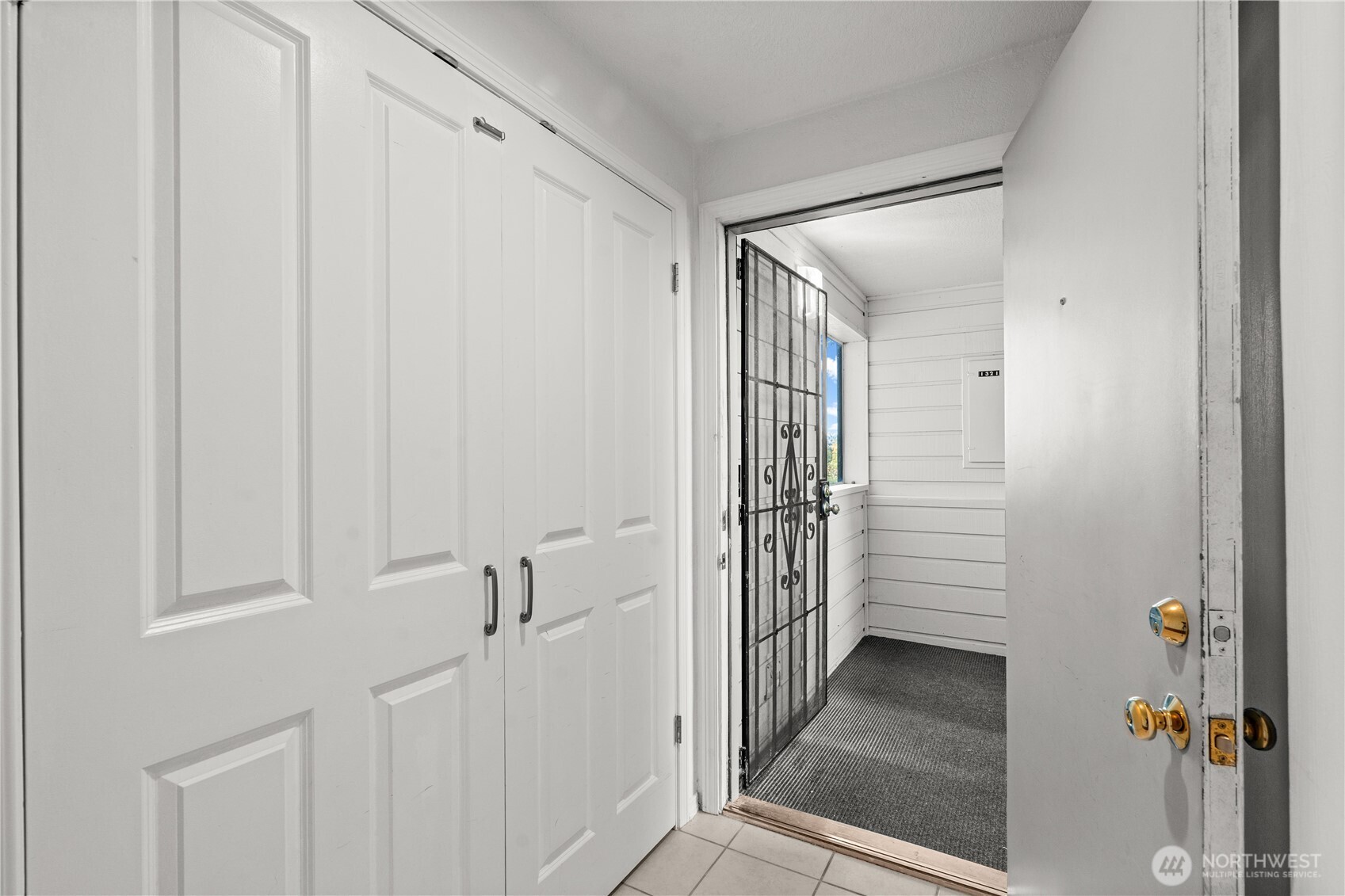 1321 South Puget Drive, Unit E15 Renton, WA 98055 - Photo 3 of 30 a view of a room with white walls