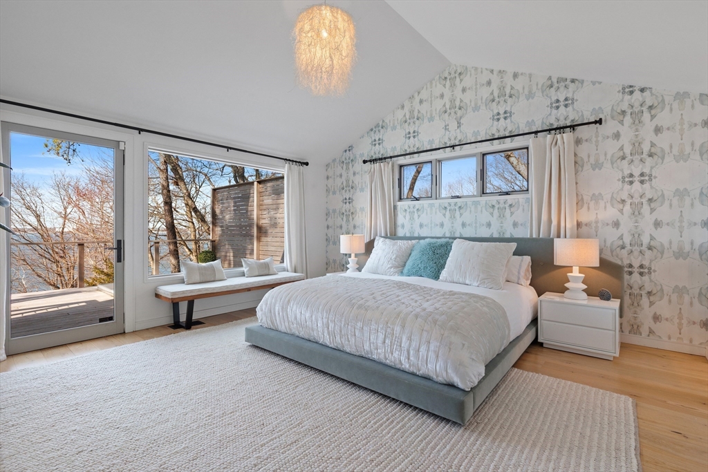 23 Pinecliff Drive Marblehead, MA 01945 - Photo 13 of 41 a bedroom with a large bed and a large window