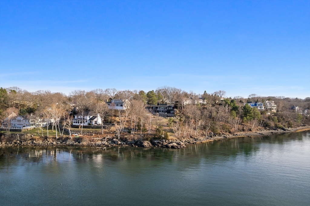 23 Pinecliff Drive Marblehead, MA 01945 - Photo 33 of 41 a view of a lake with houses