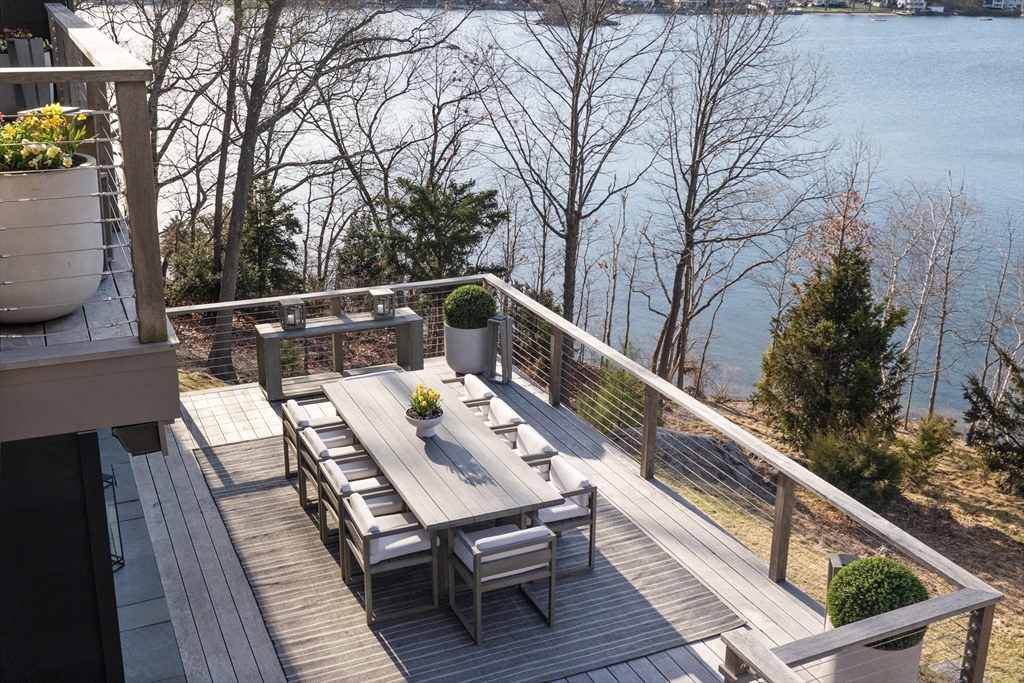 23 Pinecliff Drive Marblehead, MA 01945 - Photo 35 of 41 a view of balcony with wooden floor and outdoor seating