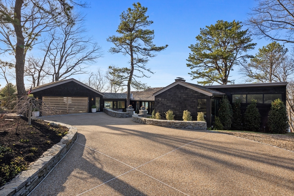 23 Pinecliff Drive Marblehead, MA 01945 - Photo 40 of 41 a front view of a house with a yard