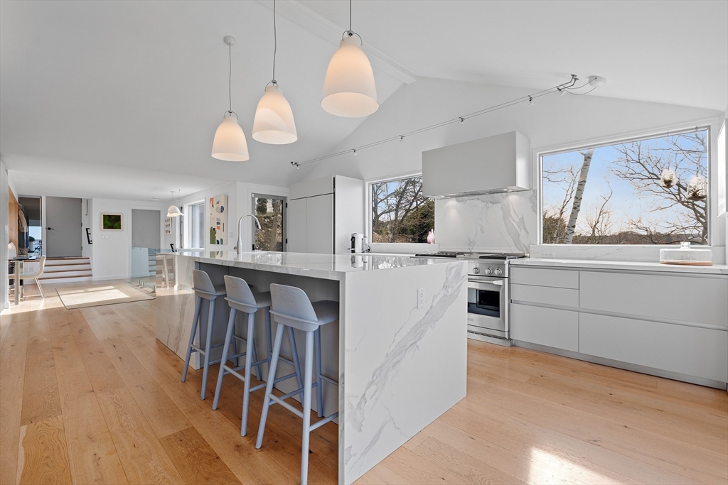 23 Pinecliff Drive Marblehead, MA 01945 - Photo 4 of 41 a kitchen with stove and cabinets