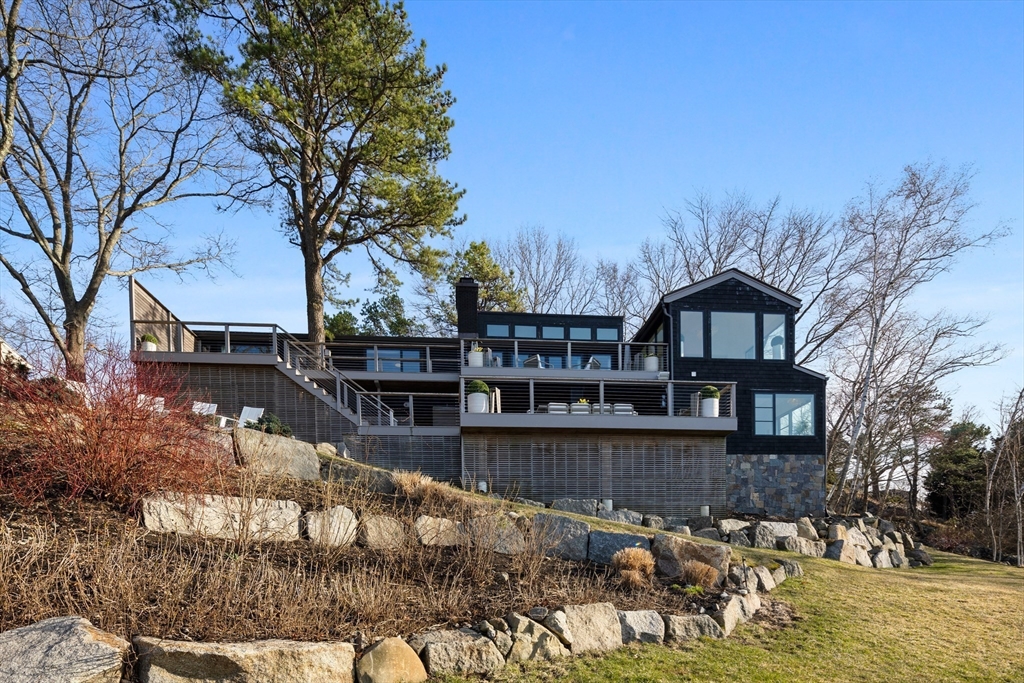 23 Pinecliff Drive Marblehead, MA 01945 - Photo 41 of 41 a front view of house with yard and lake view