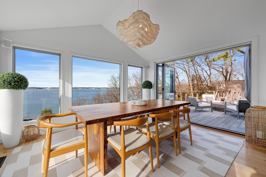 23 Pinecliff Drive Marblehead, MA 01945 - Photo 9 of 41 a living room with furniture and a large window