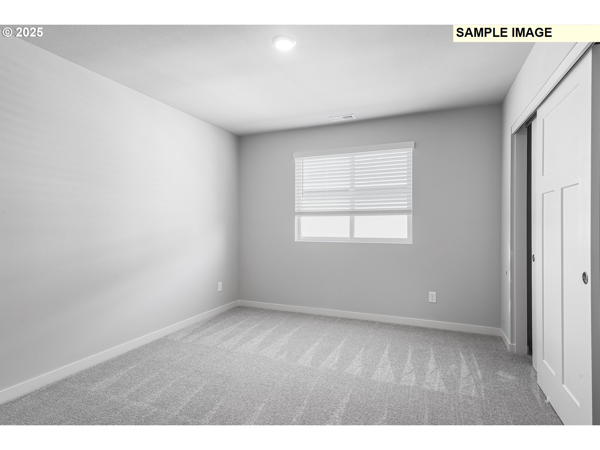 1036 Legacy Street Eugene, OR 97402 - Photo 13 of 18 a view of an empty room with wooden floor and a window