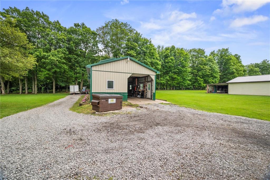 500 Kinsman Road Jamestown, PA 16134 - Photo 3 of 43 a view of a house with a yard and large tree