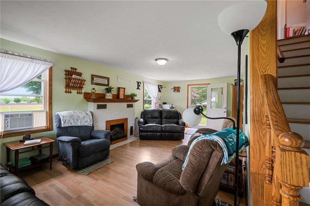 500 Kinsman Road Jamestown, PA 16134 - Photo 4 of 43 a living room with furniture fireplace and a large window