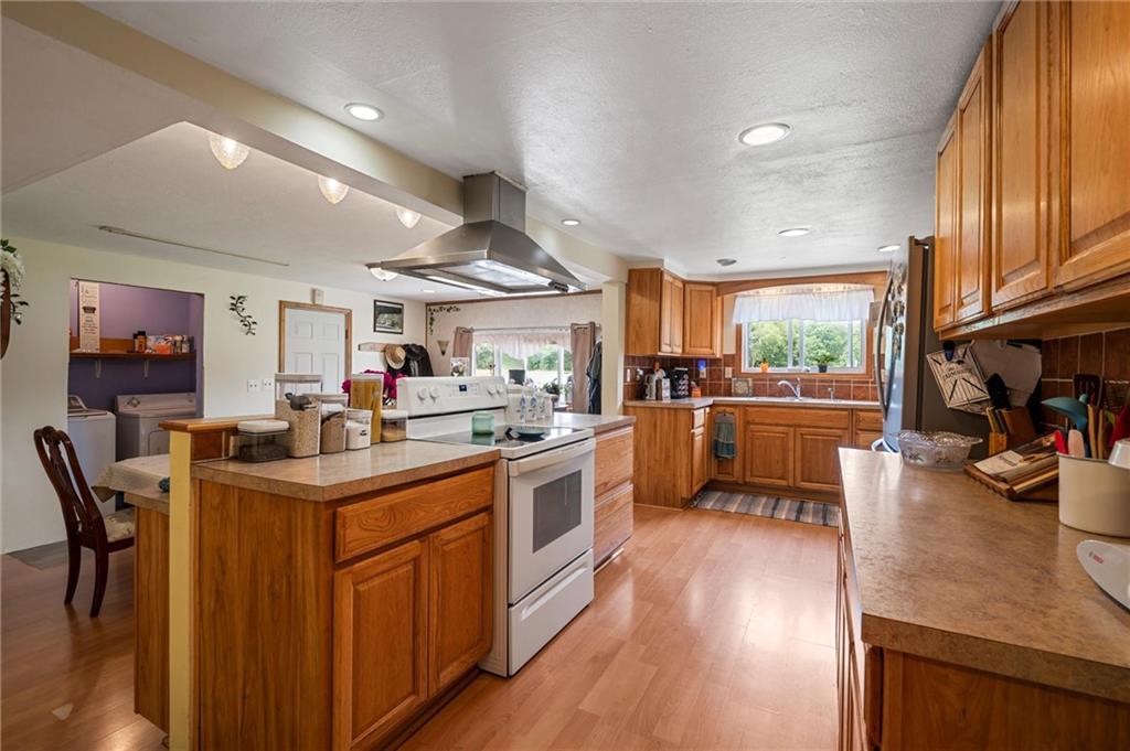 500 Kinsman Road Jamestown, PA 16134 - Photo 7 of 43 a kitchen with stainless steel appliances granite countertop lots of counter top space