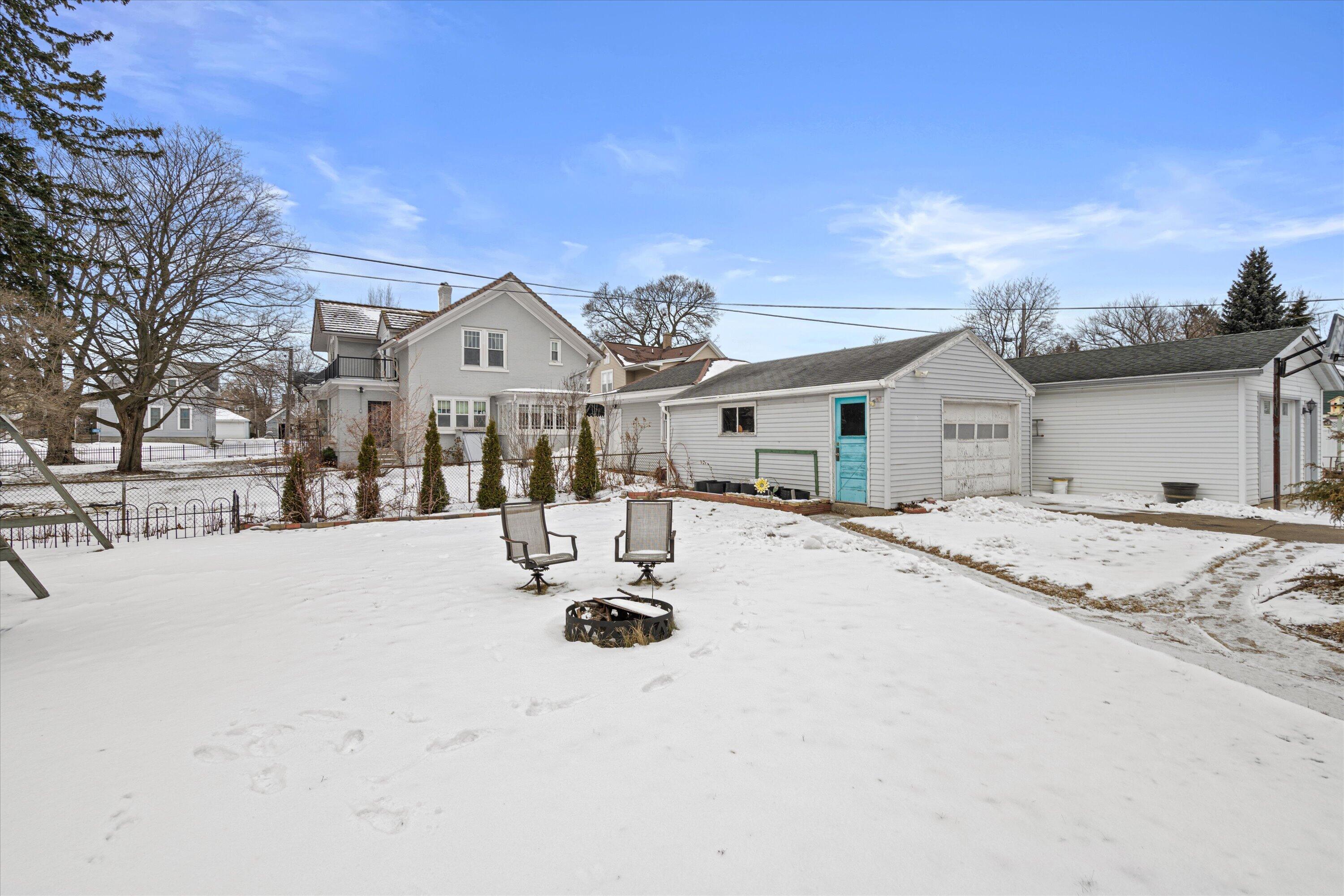 820 North 8th Street Manitowoc, WI 54220 - Photo 26 of 33 Side Yard & Garage