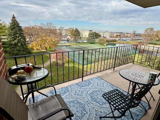 a view of swimming pool from a balcony